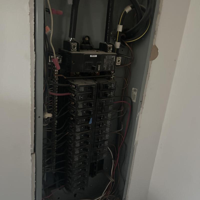 Electrical breaker panel with multiple circuit breakers installed Electrical breaker panel with multiple circuit breakers installed
