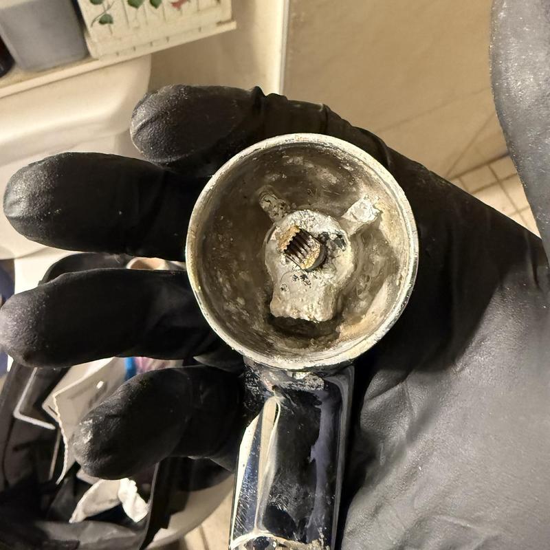 Delta shower handle with corroded interior held