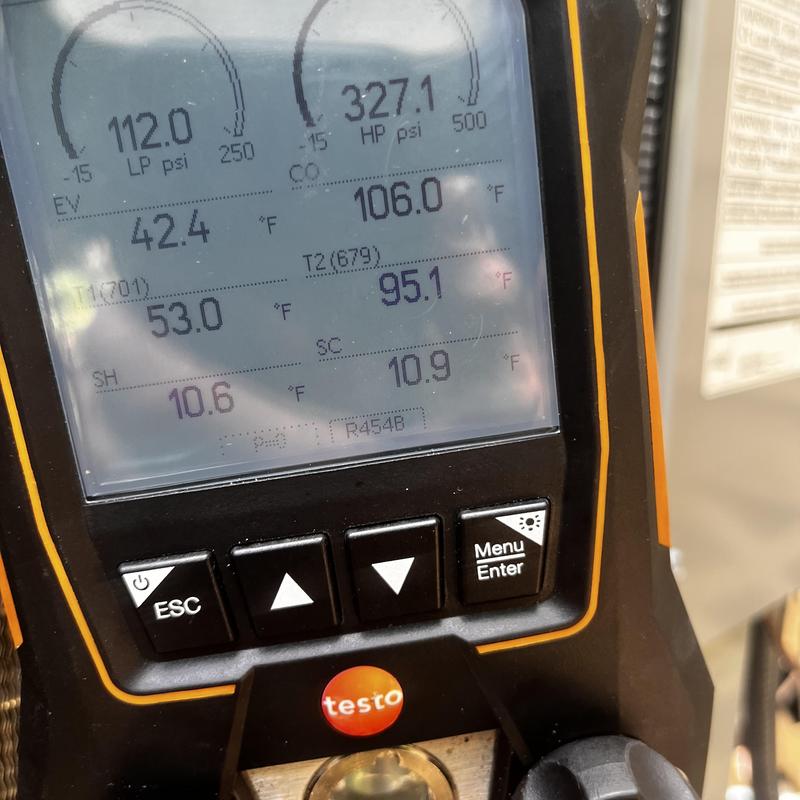 Refrigerant gauge showing HVAC system pressure and temperature