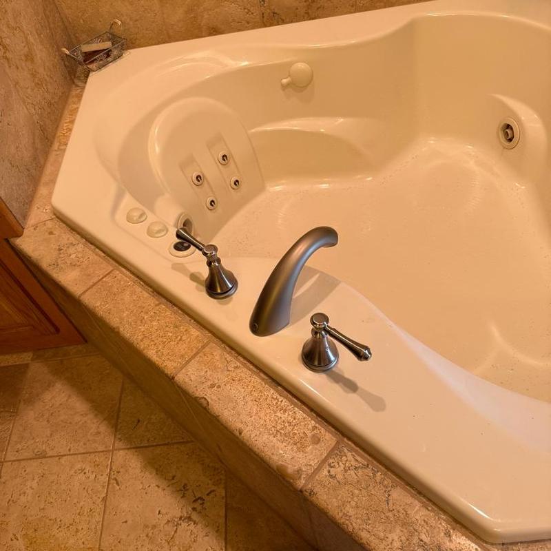 Tub faucet with new Delta handles installed Tub faucet with new Delta handles installed