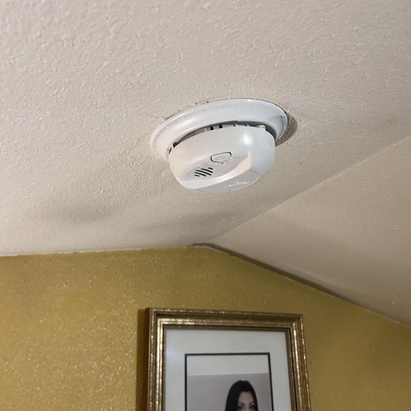 Smoke detector installation on ceiling in Kuna, Idaho