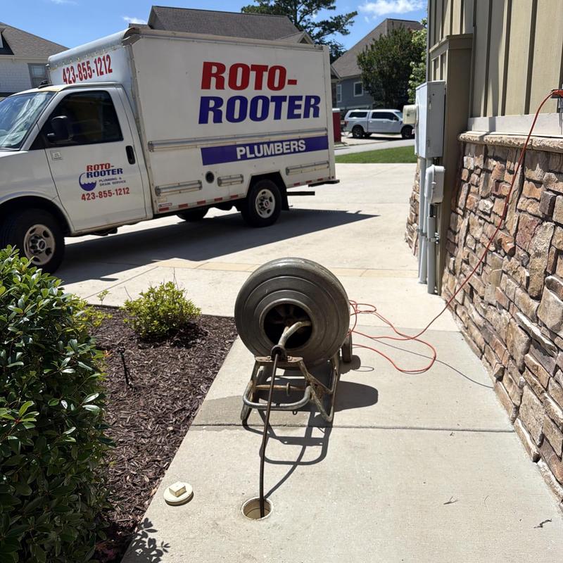 Main sewer line cable machine at residential cleanout Main sewer line cable machine at residential cleanout