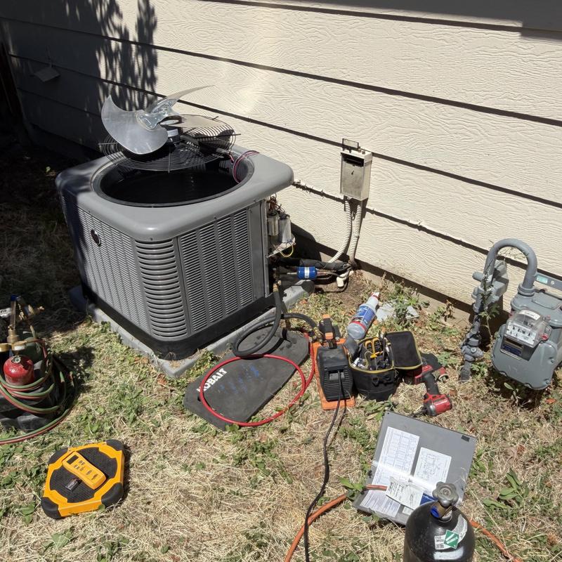 2024 Ruud AC unit compressor replacement setup outdoors 2024 Ruud AC unit compressor replacement setup outdoors