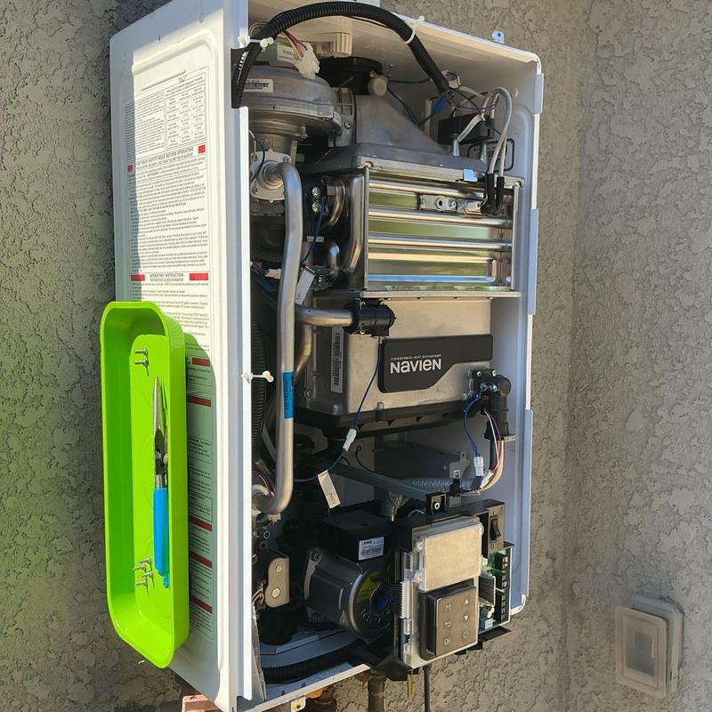 Tankless water heater with new flow sensor installed