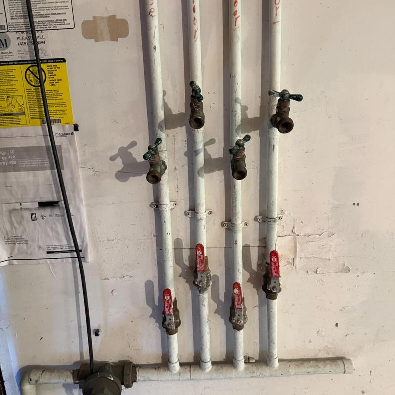 Water supply pipes with shutoff valves and spigots
