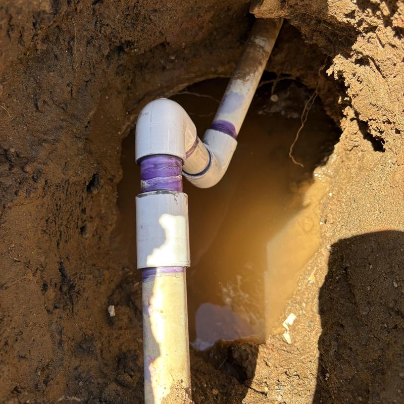 PVC water line with couplings and primer installation