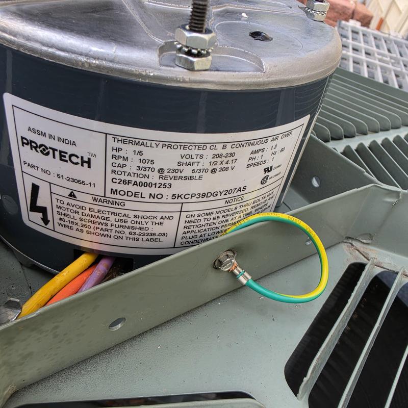 Condenser fan motor label on Rheem AC unit