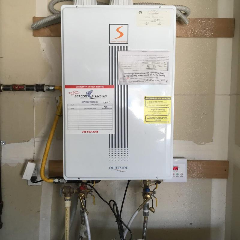 Tankless water heater with service tags and pipes Tankless water heater with service tags and pipes