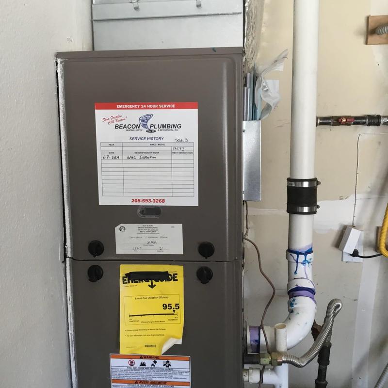 Furnace unit with HVAC inspection service record label Furnace unit with HVAC inspection service record label