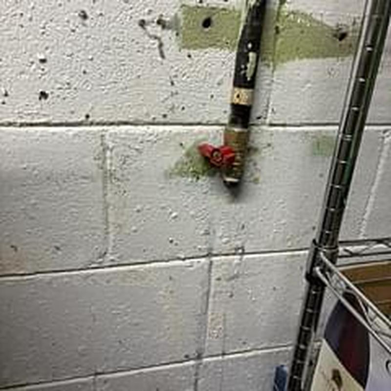 Dryer AGA valve replacement on basement wall