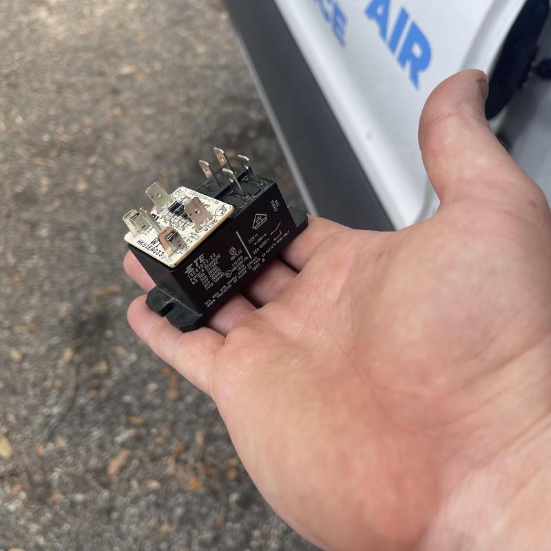 Heat kit relay replacement for HVAC system in hand
