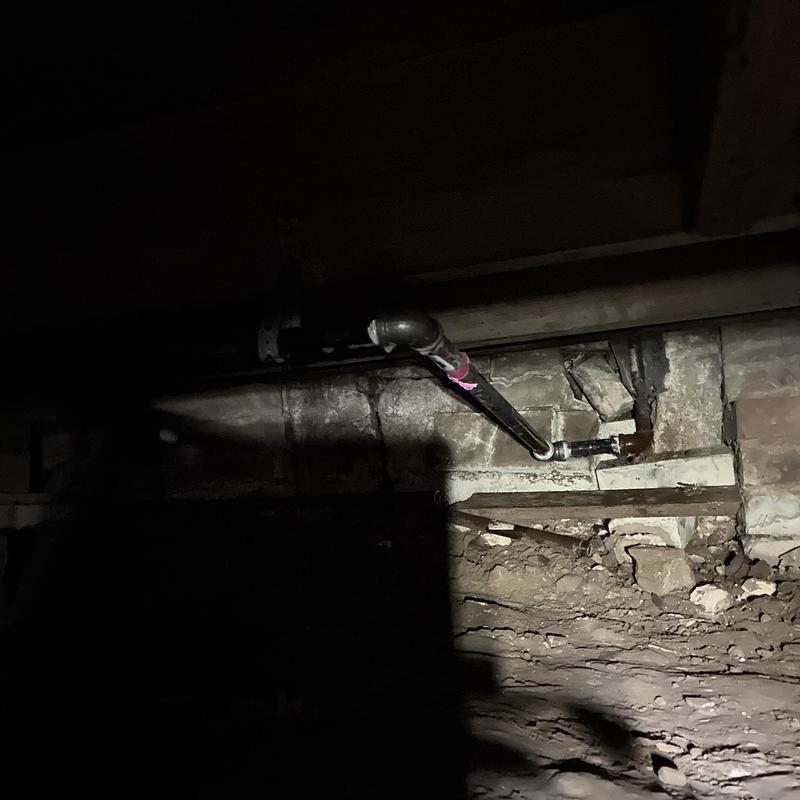 Gas line pipe with repaired leak in crawl space Gas line pipe with repaired leak in crawl space