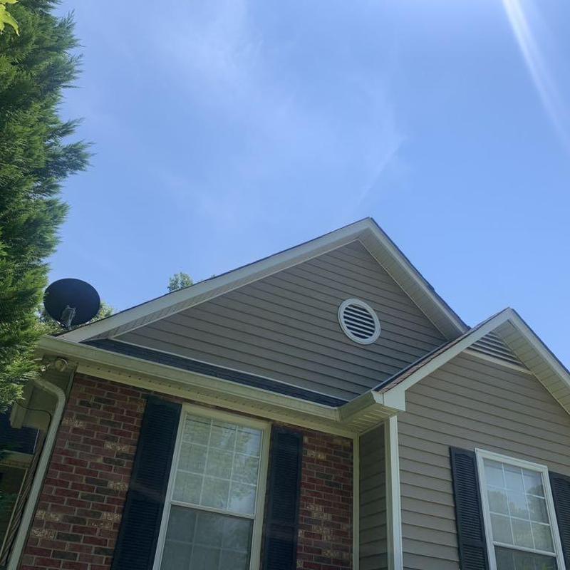 Vinyl siding installation on residential home exterior