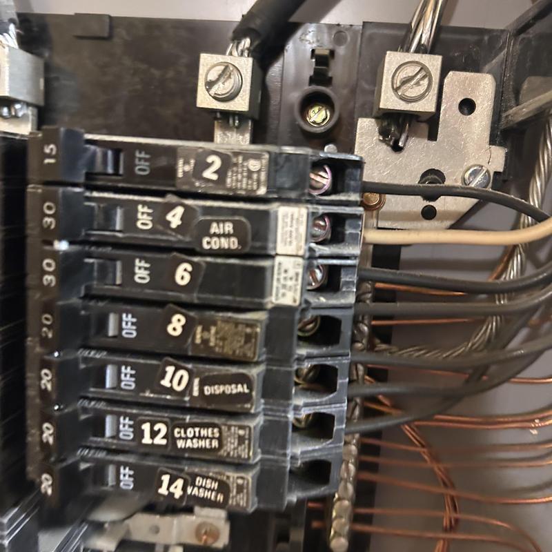 Air conditioner breaker panel with labeled switches Air conditioner breaker panel with labeled switches