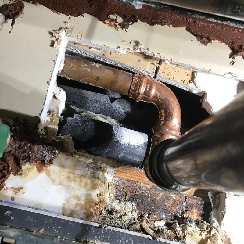 Copper water pipe with new fitting inside wall cavity Copper water pipe with new fitting inside wall cavity