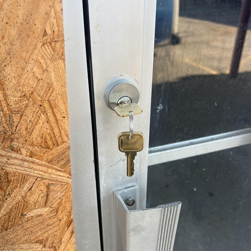 Front door deadbolt lock with new key installed