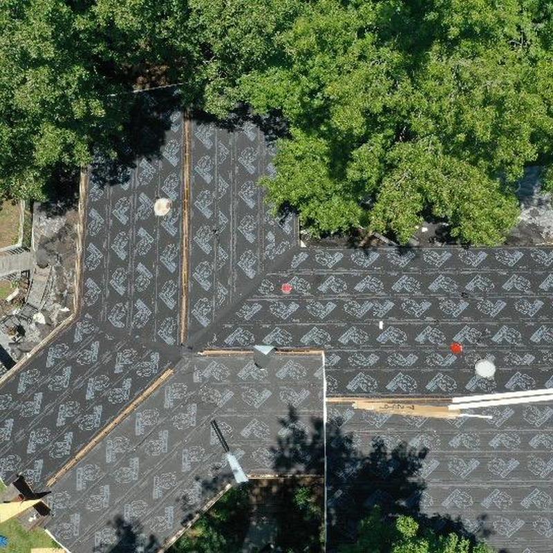 Roof underlayment installation on residential home