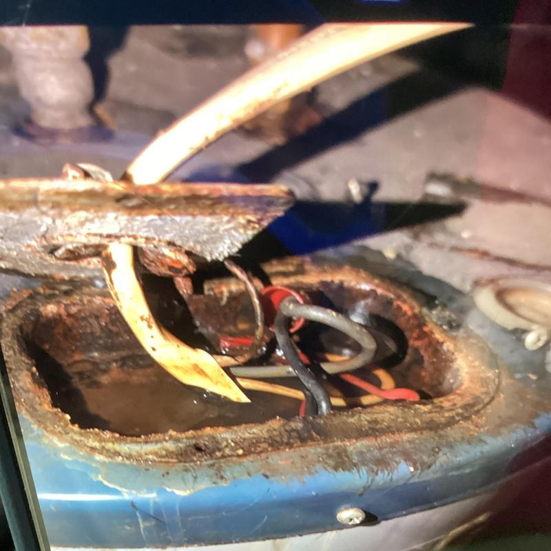 Electric water heater leak causing rust and water buildup Electric water heater leak causing rust and water buildup