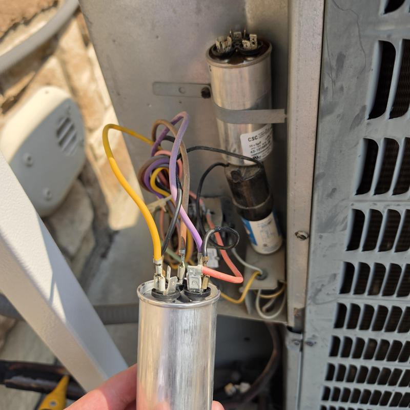 Voltage absorption capacitor in Goodman condenser unit