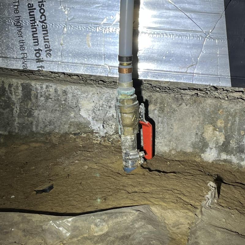 Polybutylene pipe with valve in basement crawlspace Polybutylene pipe with valve in basement crawlspace