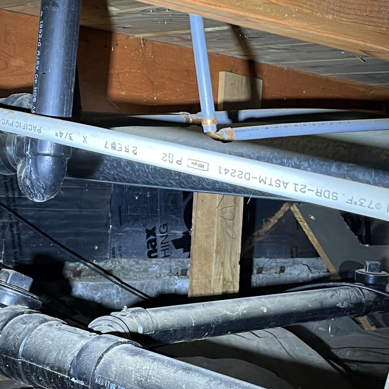 Polybutylene pipes and fittings in crawl space Polybutylene pipes and fittings in crawl space