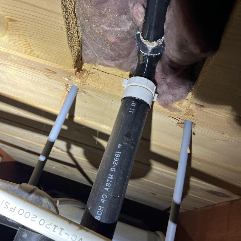 PVC drain pipe and fittings under floor joists PVC drain pipe and fittings under floor joists