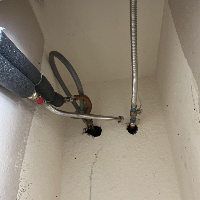 Electric water heater water supply lines in drywall niche Electric water heater water supply lines in drywall niche