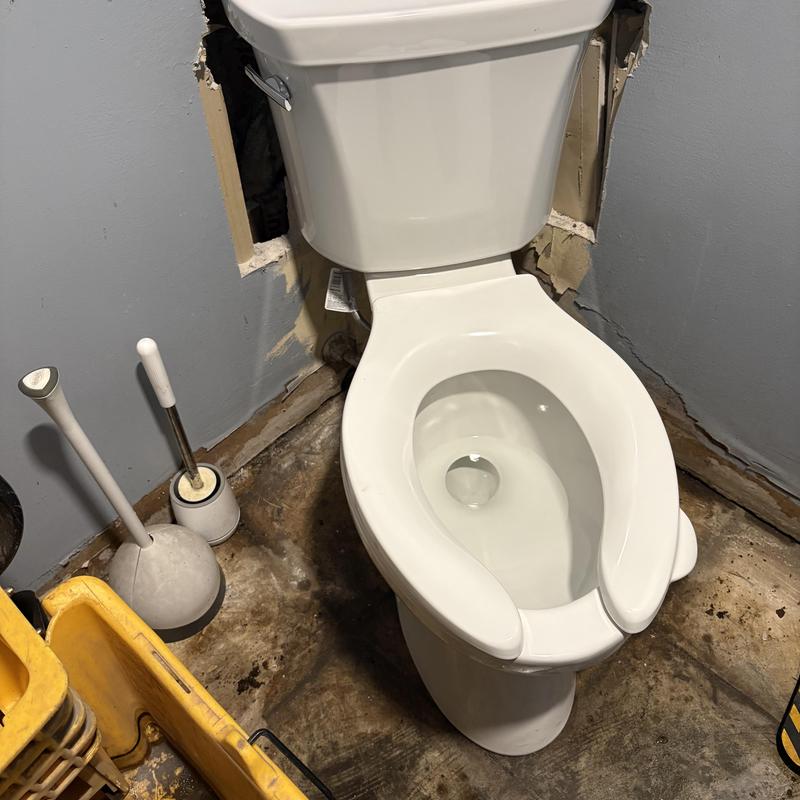 ADA compliant Kohler Highline toilet installation in bathroom
