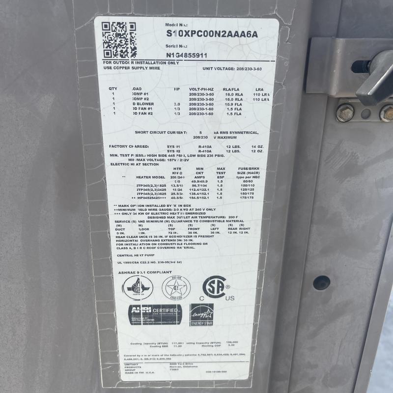 RTU model label with electrical and refrigerant specs