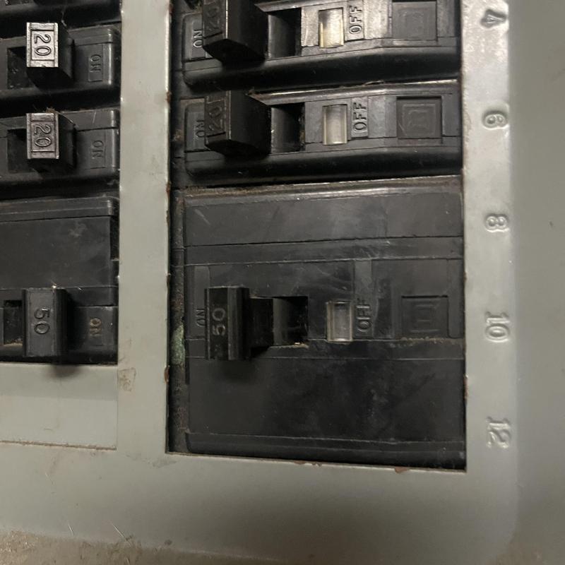 Circuit breaker panel with 50-amp breaker switch