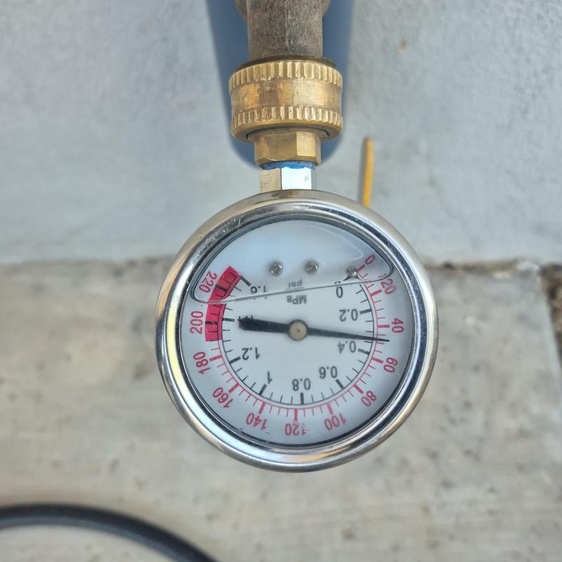 Water pressure gauge on shower plumbing system