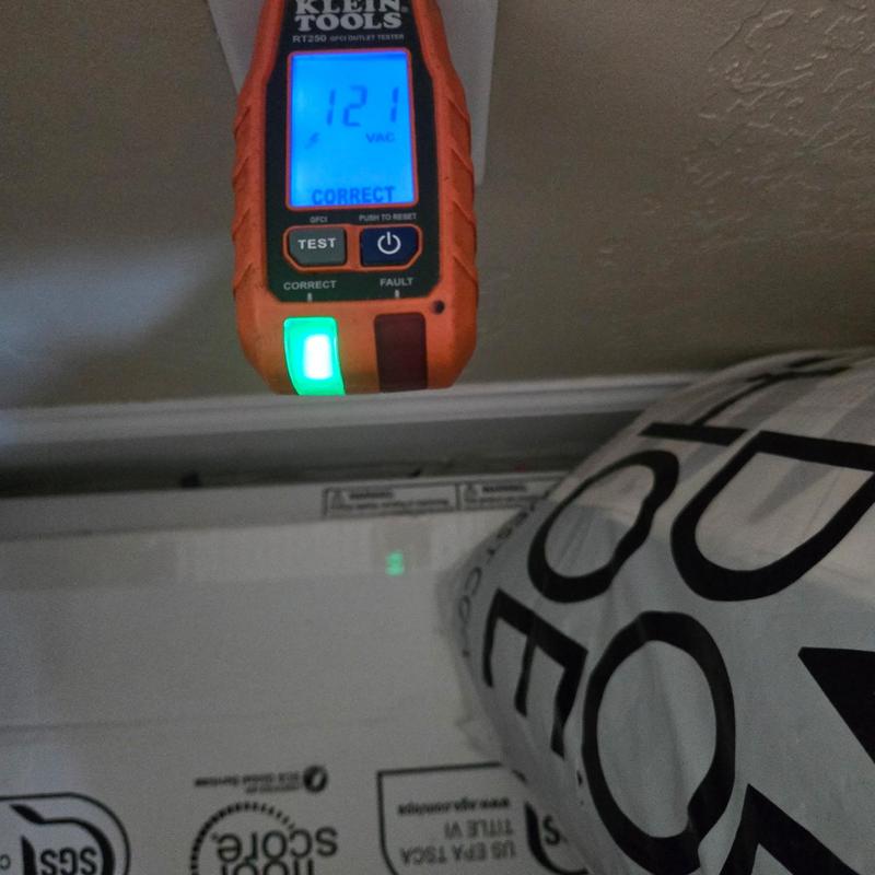 Electrical outlet voltage tester reading 121 VAC Electrical outlet voltage tester reading 121 VAC