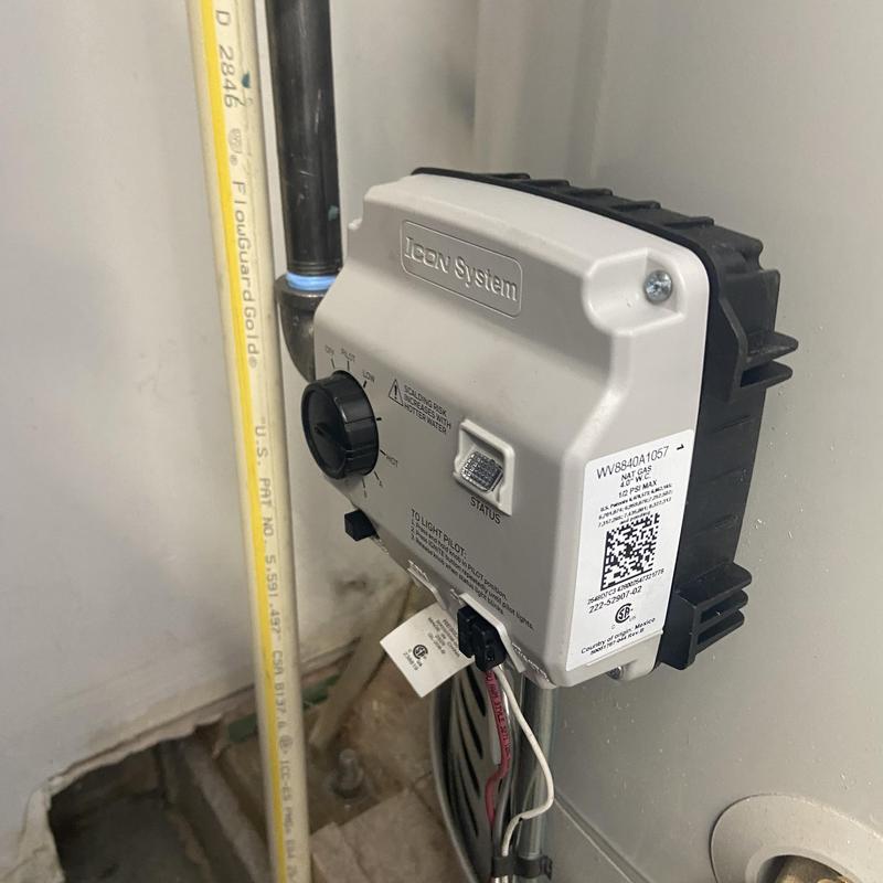 Gas control valve on water heater with wiring Gas control valve on water heater with wiring