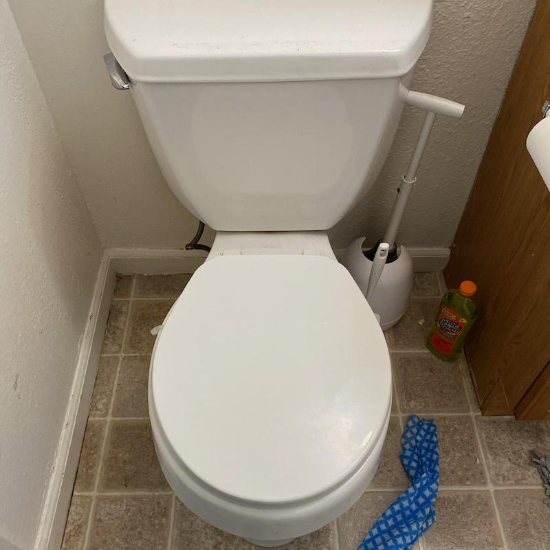 Toilet reset with new wax ring installation