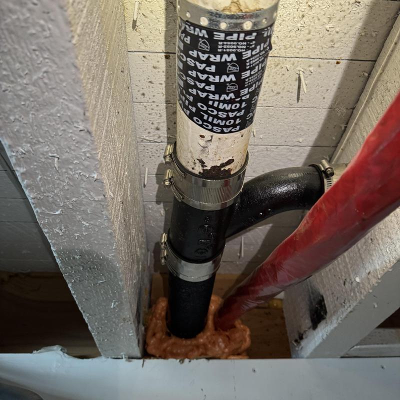3-inch cast iron drain pipe with new couplings installed