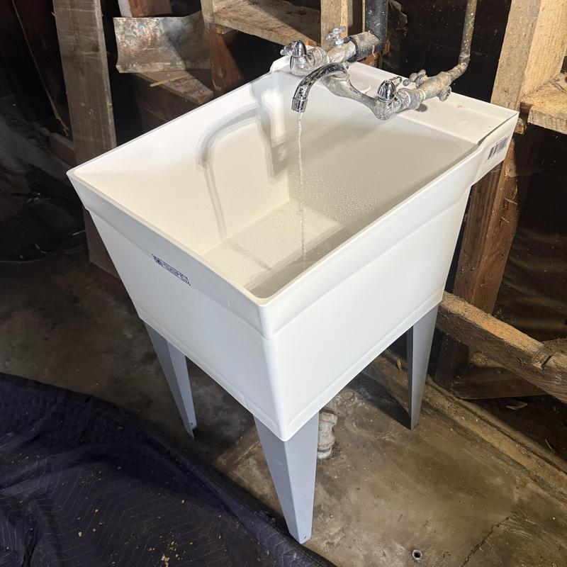Utility sink installation with running faucet testing