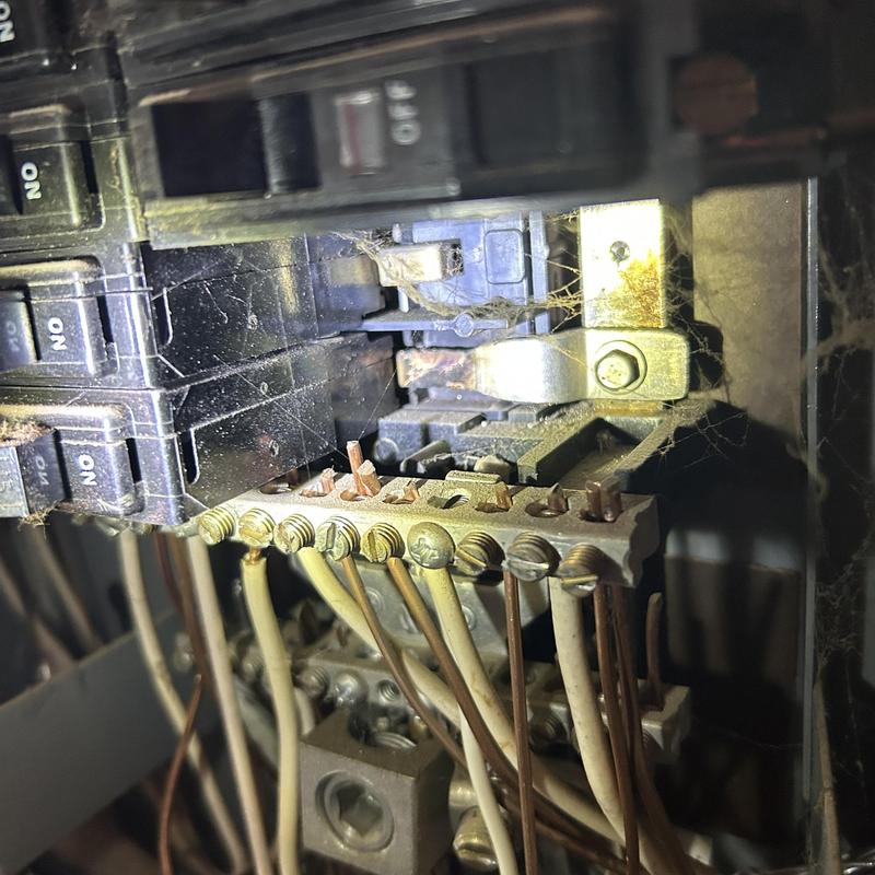 Split bus electrical panel with wiring and arc marks Split bus electrical panel with wiring and arc marks
