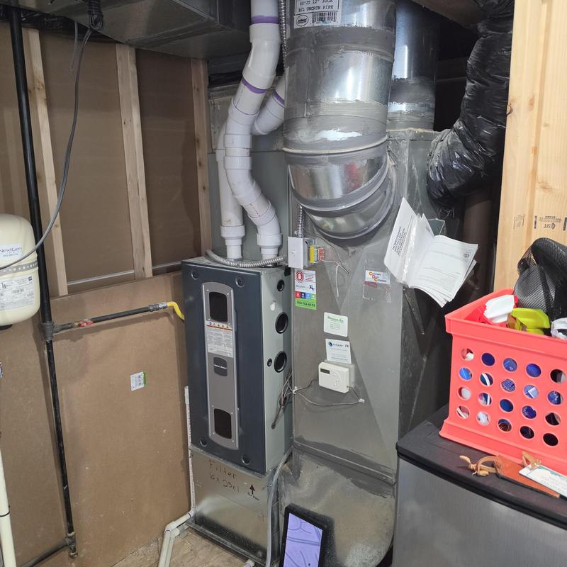 American Standard furnace and ductwork with thermostat unit