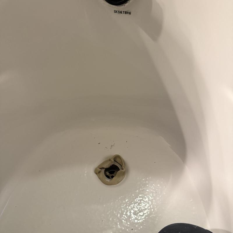 Bathtub drain with damaged stopper ring