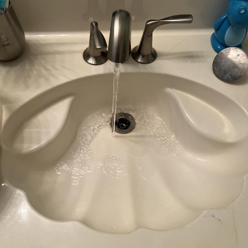 Master bathroom sink drain clearing and water flow restoration