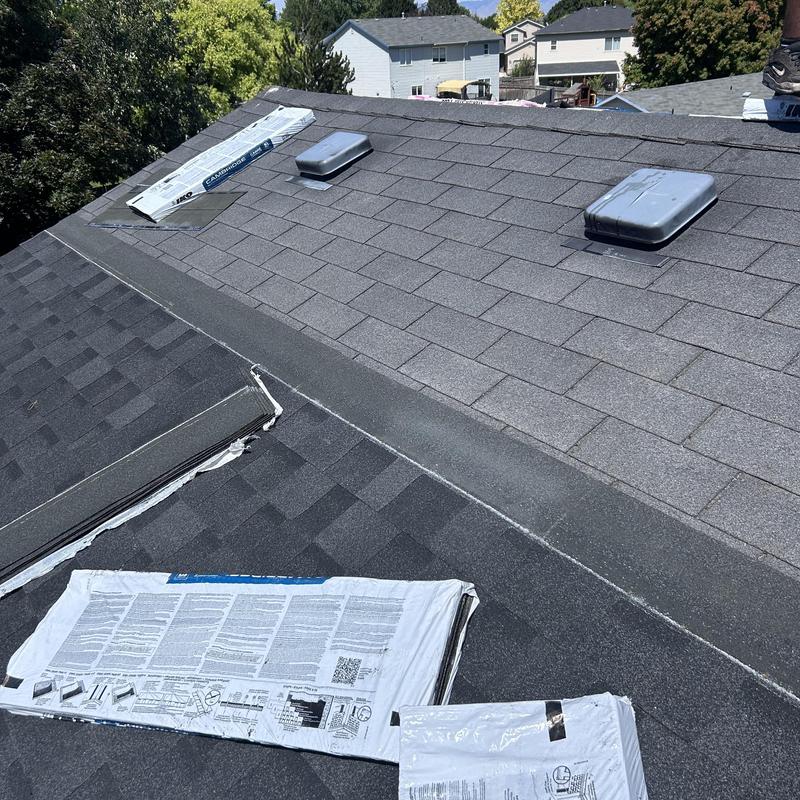 IKO Cambridge shingles installation on residential roof IKO Cambridge shingles installation on residential roof