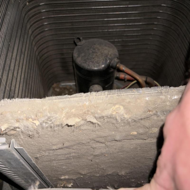 Air conditioner evaporator coil and clogged air filter inspection Air conditioner evaporator coil and clogged air filter inspection