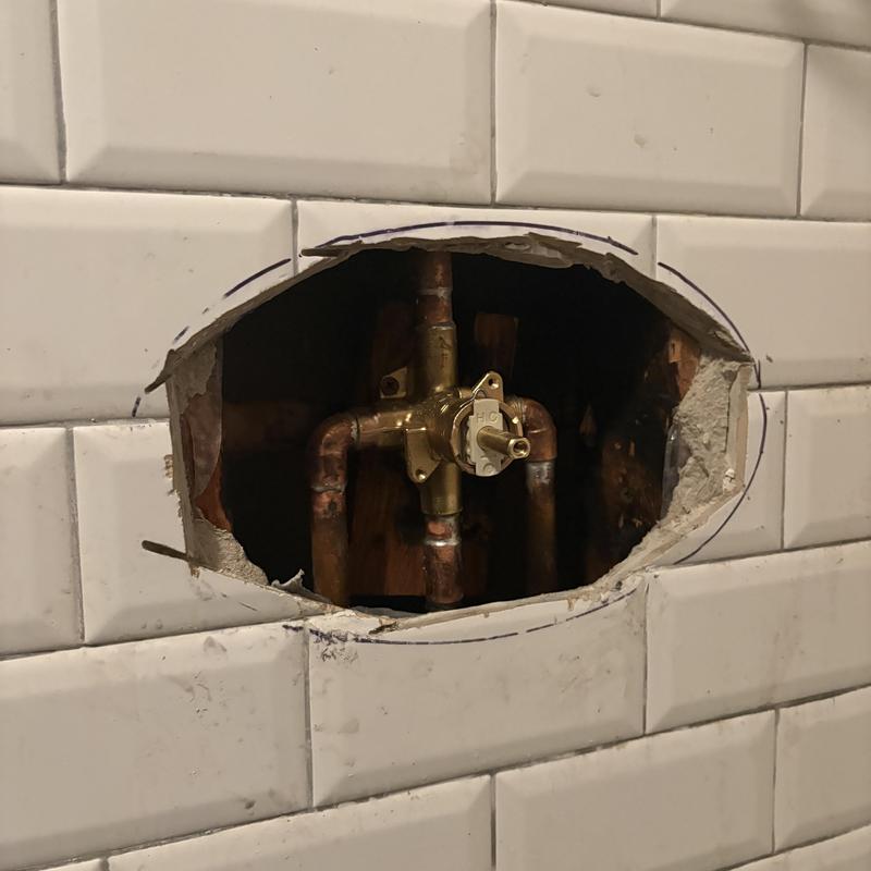 Simmons shower valve body and copper piping in wall