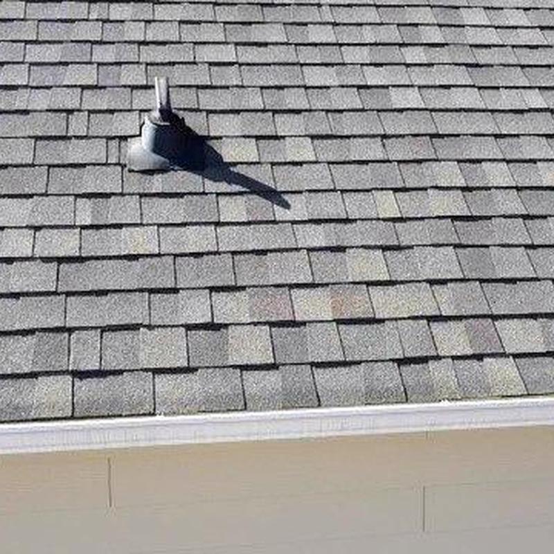 Pipe boot and asphalt shingles on residential roof