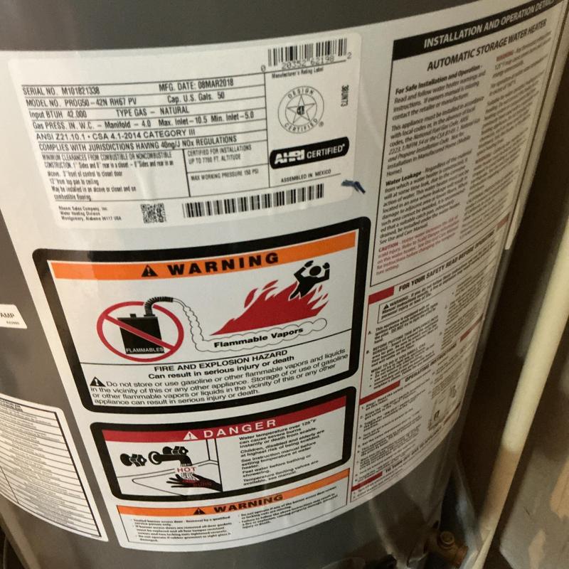 50-gallon natural gas water heater inspection label close-up 50-gallon natural gas water heater inspection label close-up