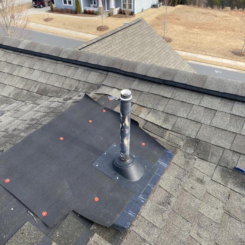 Roof vent flashing installation on shingle roof