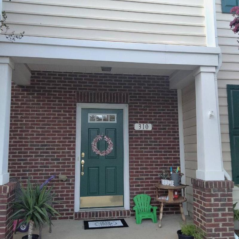 Metal fascia and vinyl siding on porch exterior