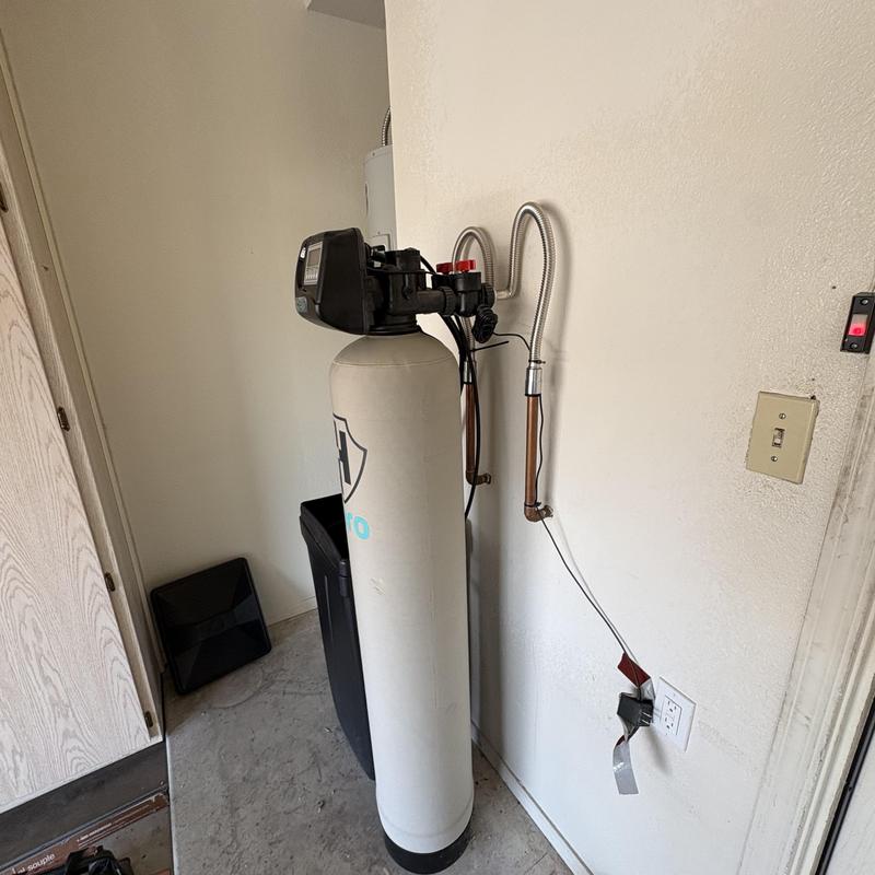 Water softener system with control valve and piping