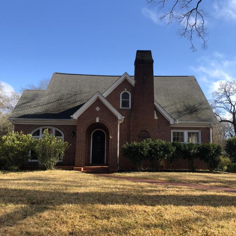 Asphalt shingle roof on brick residential home