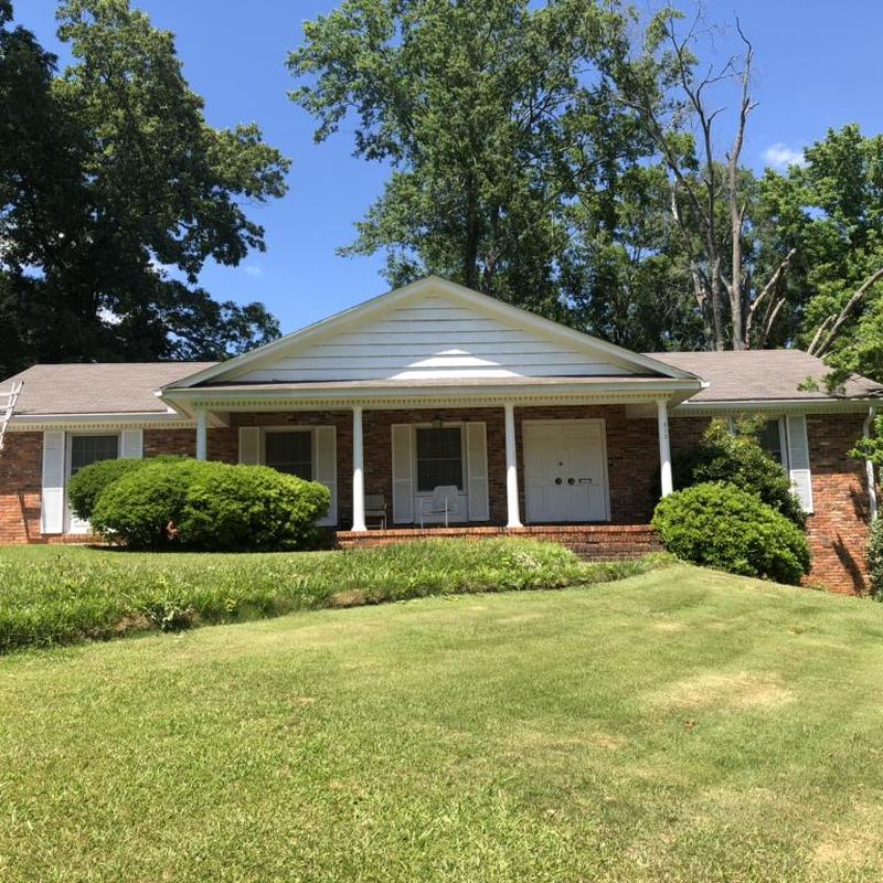 Architectural shingle roof with wind and hail damage